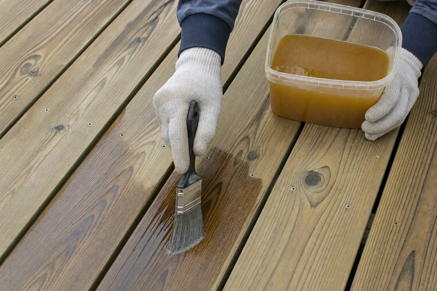 Pressure-treated wood deck boards